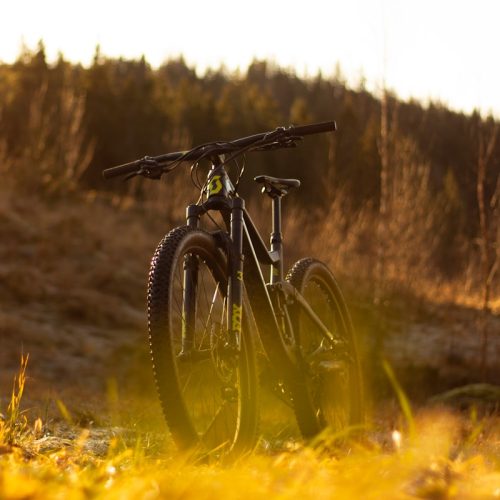 parked hiking bike on grass during day